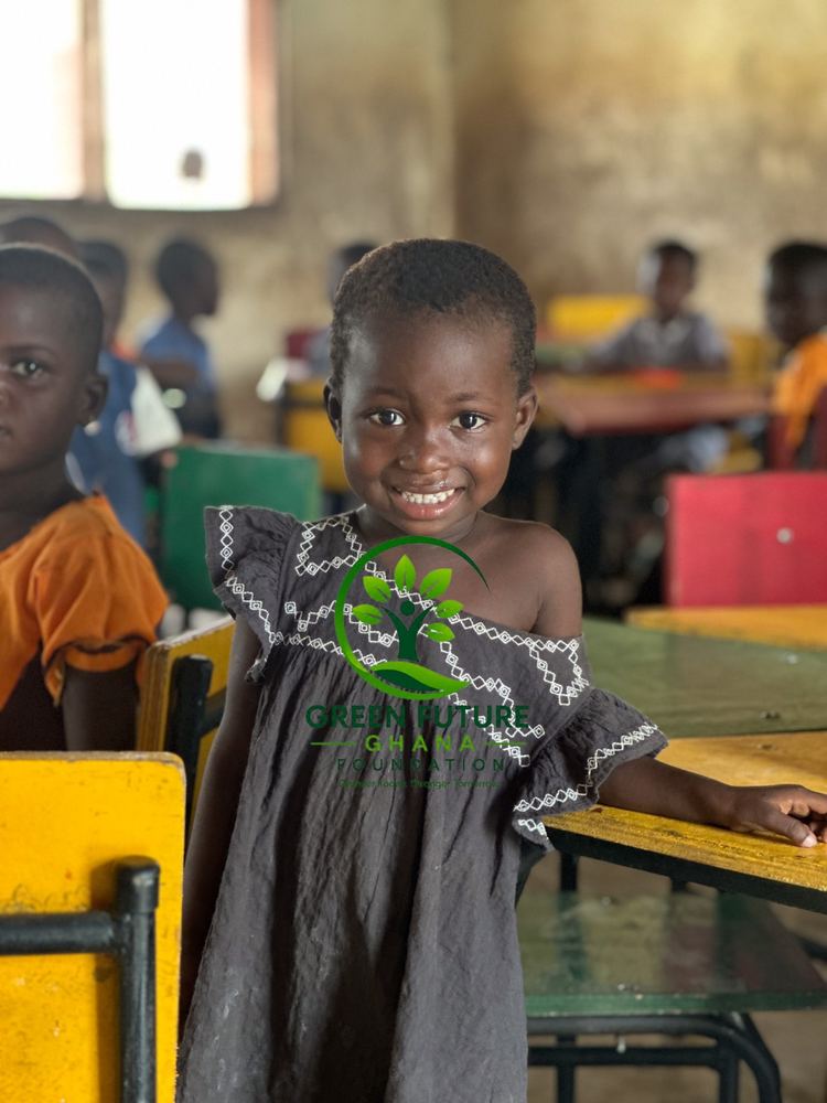 A smiling girl in a classroom