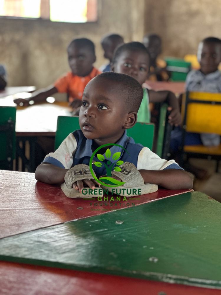 A young pupil seated at a classroom desk